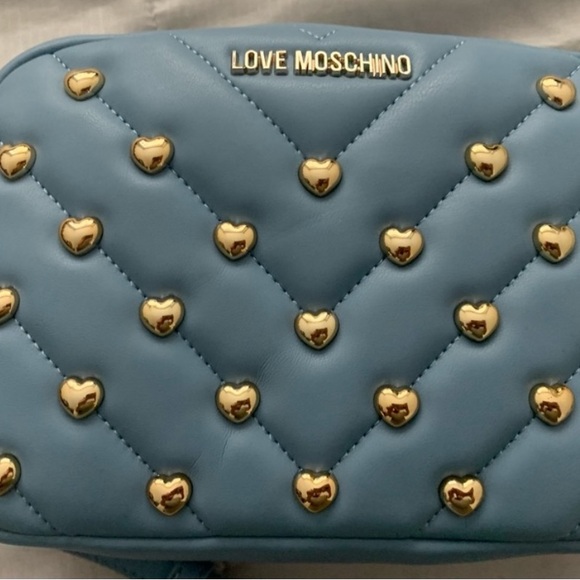 Love Moschino Handbags - Love Moschino baby blue Gold Hearts Studded Crossbody Handbag.